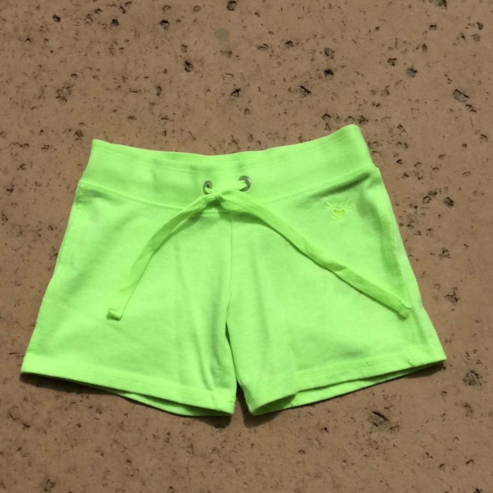 Neon green justice shorts